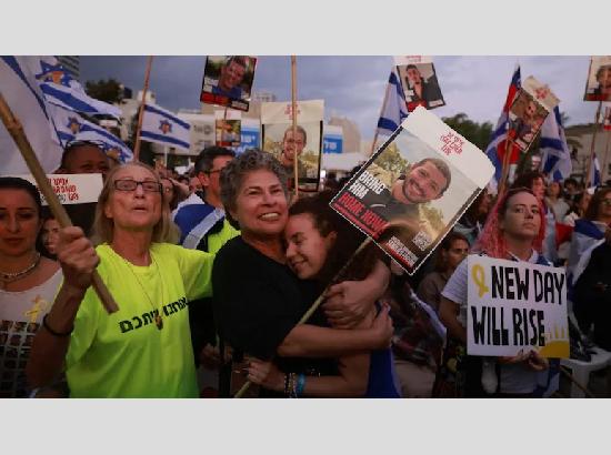 Israel-Hamas War : हमास की कैद से रिहा 7 बंधकों का पहला बैच इजरायल पहुंचा